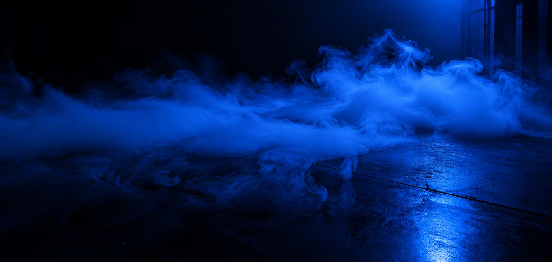 Dry ice fog lit in deep blue